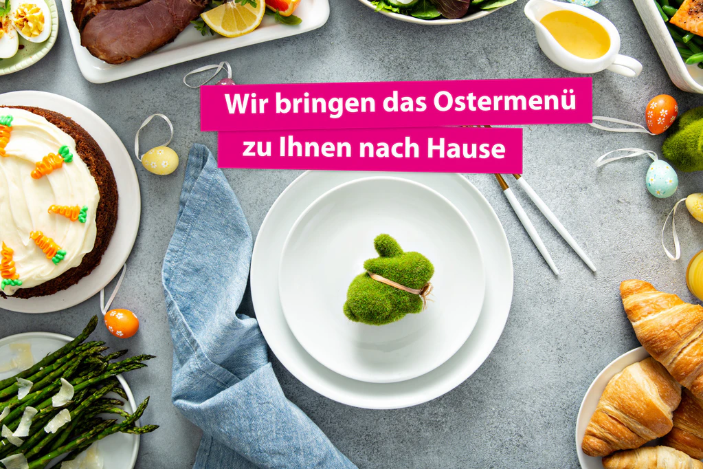  — © Big traditional Easter brunch with ham, quiche lorraine and carrot cake and place setting