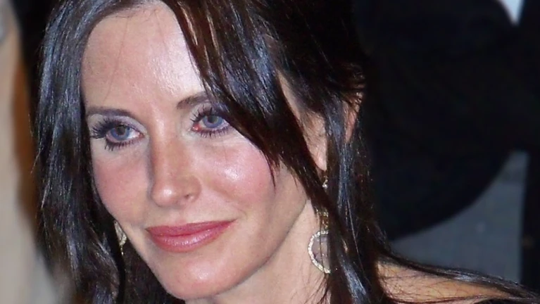Courteney Cox — © By Albert Domasin, CC BY-SA 2.0, https://commons.wikimedia.org/w/index.php?curid=16285782