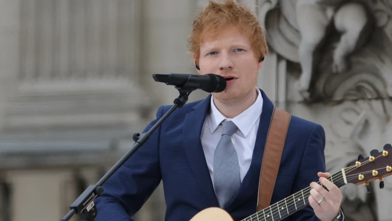 Ed Sheeran — © Von Number 10 - Queen Elizabeth II Platinum Jubilee 2022 - Platinum Pageant, CC BY 2.0, https://commons.wikimedia.org/w/index.php?curid=131298375