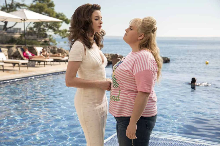  — © NW_03085_RAnne Hathaway stars as Josephine Chesterfield and Rebel Wilson as Penny Rust in THE HUSTLE, a Metro Goldwyn Mayer Pictures film.Credit: Christian Black / Metro Goldwyn Mayer Pictures© 2018 Metro-Goldwyn-Mayer Pictures Inc.  All Rights Reserved.