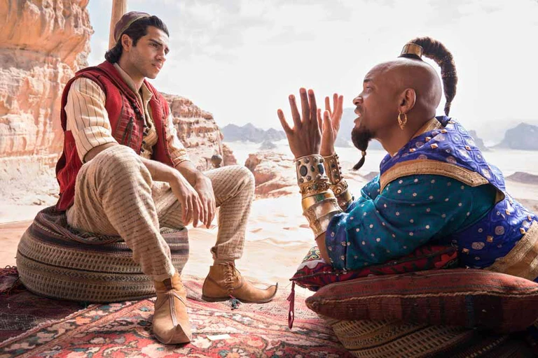 — © Mena Massoud as the street rat with a heart of gold, Aladdin, and Will Smith as the larger-than-life Genie in Disney’s ALADDIN, directed by Guy Ritchie.