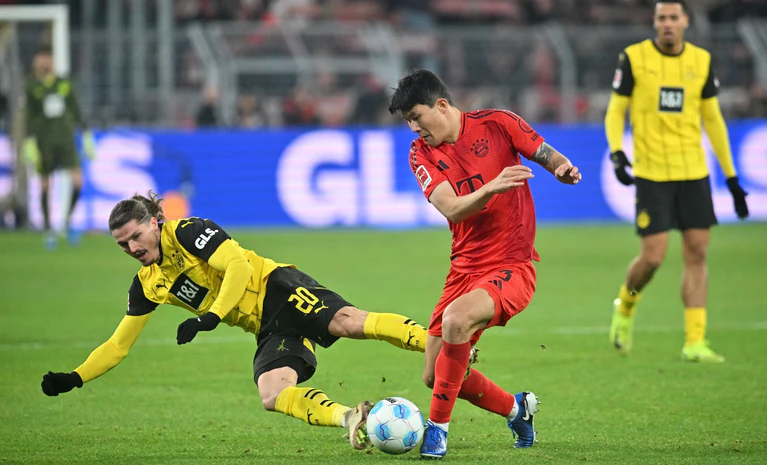 Minjae Kim wird gegen Leverkusen im Team erwartet. — © Bernd Thissen/dpa
